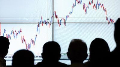 Global investors ditched bonds last month after comments by the Federal Reserve chairman Ben Bernanke on easing monthly bond purchases under its quantitative easing strategy. Yasuyoshi Chiba / AFP