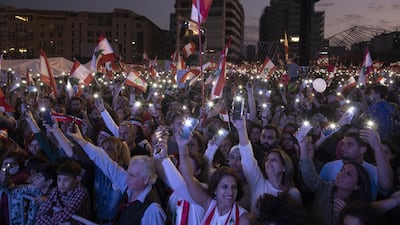 Protesters gather for a mass demonstration in Martyr Square in Beirut, Lebanon, to celebrate the 76th anniversary of its independence. EPA/ANDRE PAIN