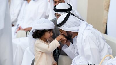 Sheikh Tahnoun bin Mohamed, Ruler's Representative in Al Ain Region, greets Sheikh Mohamed bin Khalifa bin Tahnoun during the group wedding.
