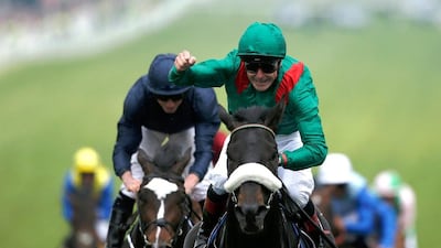 Pat Smullen riding Harzand win The Investec Derby from US Army Ranger, left, and at Epsom Racecourse on June 4. Alan Crowhurst / Getty Images