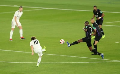 Luka Modric scores Real Madrid's opening goal against Al Ain. Reuters