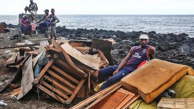 Stranded residents are seen on April 27, 2019 in Fumbuni, 56km south of Comoros capital Moroni, following the passage of the cyclone Kenneth. Thousands of people in remote areas of storm-lashed Mozambique were homeless Saturday and bracing for imminent flooding, food and water shortages as Cyclone Kenneth flattened entire villages, leaving rescuers struggling to reach them. AFP