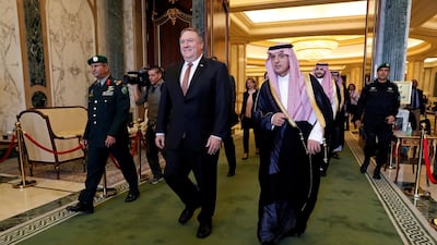 Mike Pompeo walks with Saudi Foreign Minister Adel Al Jubeir. Reuters
