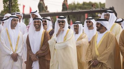 Sheikh Khaled bin Zayed, Deputy Chairman of Etihad Airways, Sheikh Nahyan bin Zayed, Chairman of the Board of Trustees of Zayed bin Sultan Al Nahyan Charitable and Humanitarian Foundation, Ahmed Juma Al Zaabi, Deputy Minister of Presidential Affairs and Sheikh Saif bin Mohamed n, attend a flag raising ceremony in celebration of the UAE’s 43rd National Day at the Breakwater in Abu Dhabi. Donald Weber / Crown Prince Court - Abu Dhabi