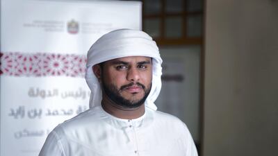 Ali Al Dhanhani visits the Ministry of Culture and Knowledge Development to complete the paperwork to get his new villa in Mohammed Bin Zayed City housing complex in Fujairah. Reem Mohammed/The National