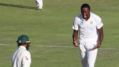 South Africa's Kagiso Rabada celebrates after taking the wicket of Australia's Usman Khawaja. Mike Hutchings / Reuters