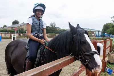 Aamilah Aswat, 15, first learnt to ride at the St James City Farm and Riding School and is part of the Khadijah Mellah scholarship, supporting eight riders around the country. Mark Chilvers / The National