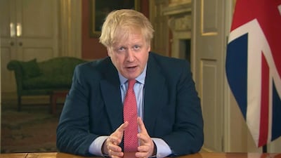 Britain's Prime Minister Boris Johnson addresses the nation from 10 Downing Street, in London, Monday March 23, 2020. UK Pool via AP