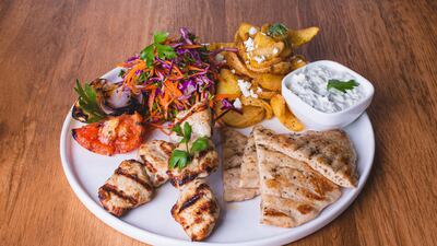 Greek food is a staple in the UAE's food halls, including at Social Distrikt and Market Island coming up at Dubai Festival City Mall. Photo: Social Distrikt