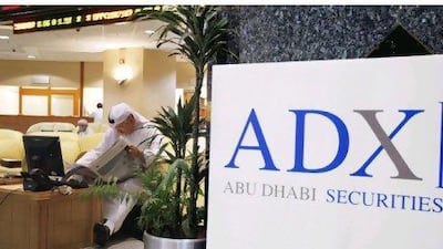 Abu Dhabi - July 21, 2009: Traders inside the Abu Dhabi Securities Exchange. ( Philip Cheung / The National ) *** Local Caption *** PC0092-ADX.jpg