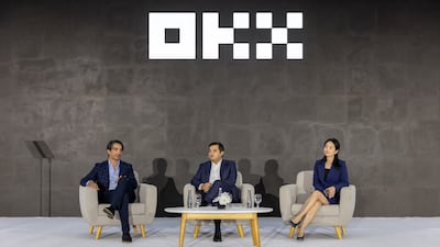 Haider Rafique, chief marketing officer of OKX, Rifad Mahasneh, Middle East general manager of OKX, and Hong Fang, president of OKX, during the UAE launch of the cryptocurrency company's platform in Dubai on Thursday. Photo: OKX