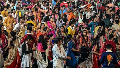 People in traditional dress perform the 'Garba' dance as part of the annual Hindu festival of Navratri at the Laxmi Vilas Palace in Vadodara, India. AFP