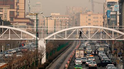Tehran is trying to spur rial as discontent grows. Atta Kenare/AFP
