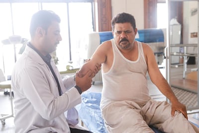 Bader Abdel Karim, 54, former fighter in the Popular Mobilisation Units. He was injured during a military operation against ISIS. Now he's an amputee and gets his weekly medical treatment at a military hospital run by PMU. Photo by Sebastian Castelier