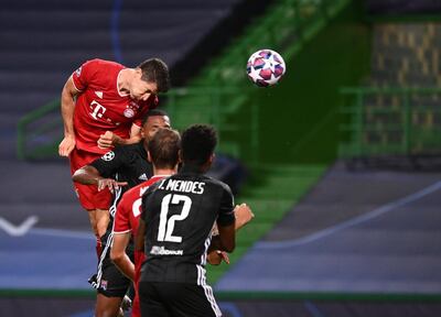 Bayern's Robert Lewandowski scores the third. AP