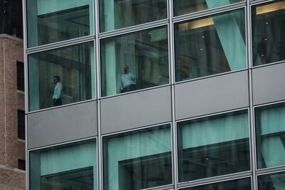 People stand on a floor at the global headquarters of Goldman Sachs investment banking firm at 200 West Street in New York City, U. S. , January 11, 2023. REUTERS / Shannon Stapleton