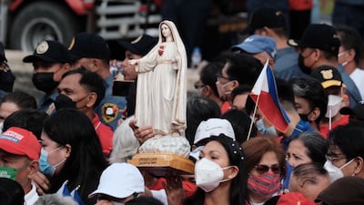 People attend the swearing-in ceremony. Bloomberg