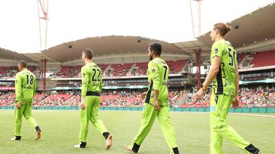 Sydney Thunder players take the field for an indigenous ceremony at the Sydney Showground Stadium. Getty Images