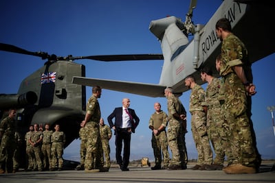 Britain's Defence Secretary John Healey meets UK military personnel at RAF Akrotiri in Cyprus. PA