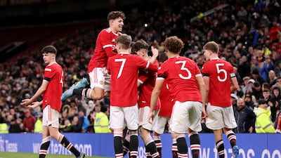 Alejandro Garnacho of Manchester United celebrates with teammates after scoring in the FA Youth Cup semi-final against Wolverhampton Wanderers at Old Trafford on March 9, 2022. Getty