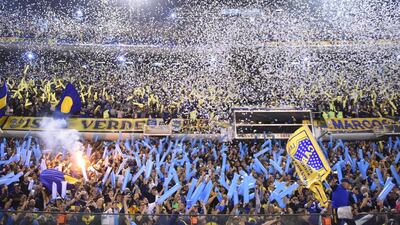 BUENOS AIRES, ARGENTINA - OCTOBER 22: Fans of Boca Juniors throw papers to receive their team prior the Semifinal second leg match between Boca Juniors and River Plate as part of Copa CONMEBOL Libertadores 2019 at Estadio Alberto J. Armando on October 22, 2019 in Buenos Aires, Argentina. (Photo by Rodrigo Valle/Getty Images)