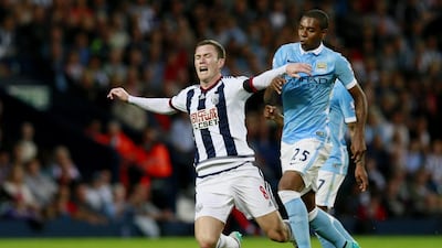 Manchester City’s Fernandinho in action with West Brom’s Craig Gardner. Jason Cairnduff / Reuters / August 11, 2015