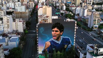A giant mural late Argentine footballer Diego Maradona, by artist Martin Ron, in Buenos Aires. Getty Images