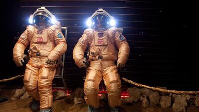 Researchers test spacesuits on a simulated Mars surface during a training session at Moscow's Institute for Medical and Biological Problems.