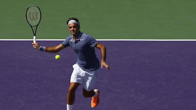 Roger Federer advanced to the fourth round of the Miami Masters on Sunday. Al Bello / Getty Images / AFP / March 23, 2014