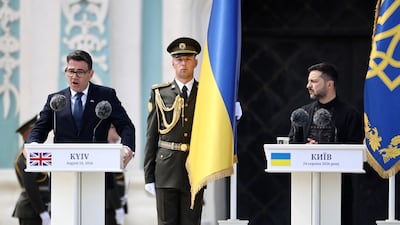Britain's Prime Minister Andy Burnham, left, gives a speech alongside Ukraine's President Volodymyr Zelenskyy, in Kyiv. AFP