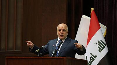 Iraq Prime Minister Haider Al Abadi gestures, during a press conference, in Baghdad, Iraq, Saturday, Dec. 9, 2017. Karim Kadim/AP