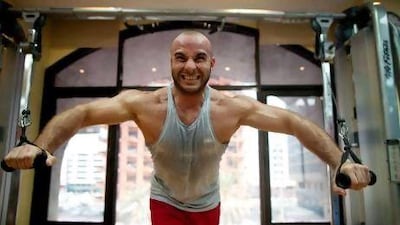 Lifting helped 'release the stress' from the conflict and the harrowing images of 'soldiers dragging a woman through the street or beating her up' emanating from his homeland, Syria, for Abu Dhabi resident Nour Yousfi. Photos by Christopher Pike / The National