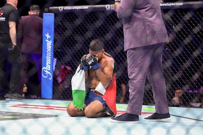 Abdul Hussein celebrates after his victory over Cody Gibson in their bantamweight bout at UFC Fight Night in Abu Dhabi on July 25. Victor Besa / The National
