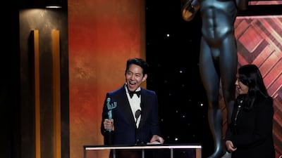 Lee Jung-Jae receives the award for Outstanding Performance by a Male Actor in a Drama Series for 'Squid Game'. Reuters