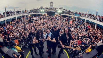 Members of the American heavy metal band Queensryche surrounded by fans on the Monsters of Rock Cruise in 2016. Courtesy Savoia Photography Live