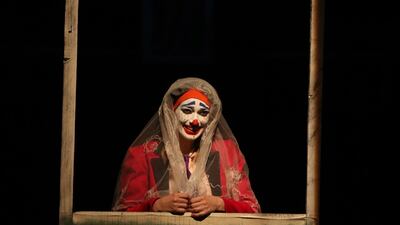epa07717630 Syrian actress Lama Baddor performs during the theatrical show 'three stories' at al-Hamra Theater in Damascus, Syria, 14 July 2019. The show is directed by Ayman Zaidan in cooperation with author Mahmoud Jaafouri for a story entitled 'Stories to be told' by Argentine writer and theater director Oswaldo Dracon. The show tells about real stories from the Syrian society during the years of war. EPA/YOUSSEF BADAWI