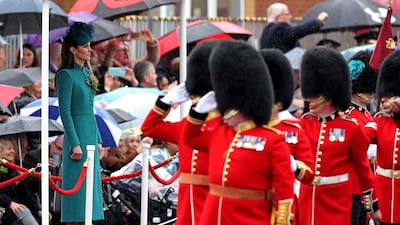 Members of the 1st Battalion Irish Guards salute the Princess of Wales. AFP