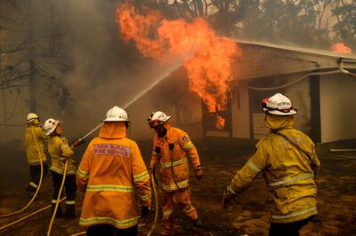 A home near Bundanoon, Australia, is on fire in 2020. The frequency and duration of droughts will continue to increase, the UN warned last month. AP Photo