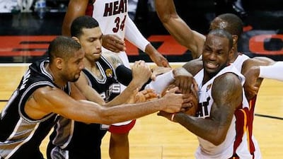 LeBron James, right, and Tim Duncan, left, were both in great form for their respective teams.