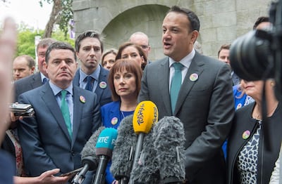 Ireland's Prime Minister Leo Varadkar addresses the media after posing with activists from the "Yes" campaign. Barry Cronin/ AFP