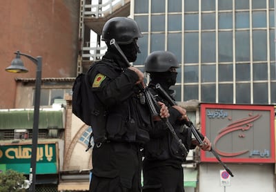 Iranian security personnel stand guard in Tehran. EPA