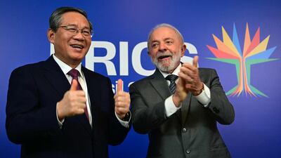 Mr da Silva with China's Premier Li Qiang in Rio de Janeiro. AFP