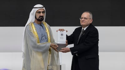 Sheikh Mohammed presents Badi Hani with the Great Minds Award in economics