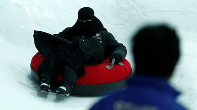 A visitor enjoys a ride at Snow City, which opened in mid July at Al Othaim Mall in Riyadh. Faisal Al Nasser / Reuters / July 26, 2016