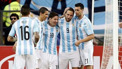 Gonzalo Higuain, second right, celebrates with Angel Di Maria, Lionel Messi and Javier Pastore after scoring the decisive goal in Argentina's narrow win over Jamaica. Felipe Trueba / EPA / June 20, 2015