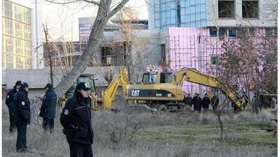 Forensic officers search for weapons in a wooded area in central Ankara in January.