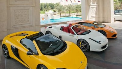 A selection of the supercars available as part of Waldorf Astoria’s Driving Experiences: a McLaren 650S (yellow), Ferrari 458 Spider (white) and Lamborghini Huracán (orange). Courtesy Waldorf Astoria