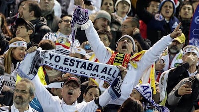 Real Madrid fans cheer for their team before the match. Kiyoshi Ota / EPA