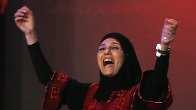 Hanan Al Hroub, the Palestinian schoolteacher, is elated after she won the US$1 million Global Teacher Prize in Dubai on Sunday. Kamran Jebreili / AP Photo