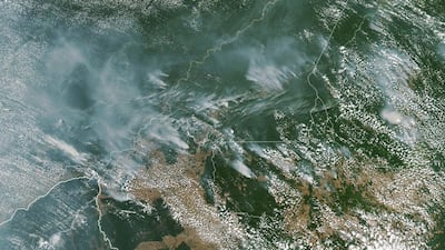 Several fires can be seen burning in the Brazilian states of Amazonas (top centre left), Para (top right), Mato Grosso (bottom right) and Rondonia (bottom centre) on August 13, 2019. EPA